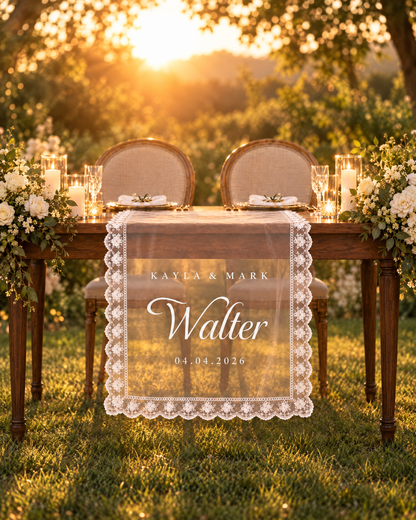 Sweetheart table sign backlit at golden hour in an outdoor garden reception